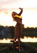 Naked blonde play with fire