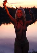 Naked blonde play with fire