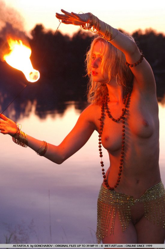 Naked blonde with fire