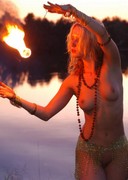 Naked blonde play with fire